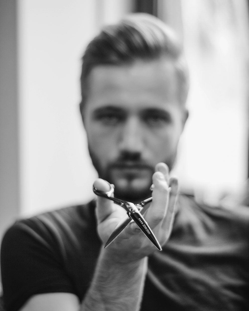 Danny Stanton with his scissors, between cuts